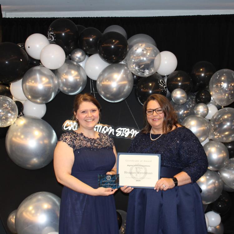  Two women in front of balloons